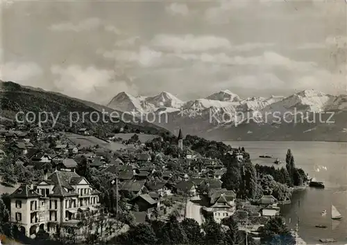 AK / Ansichtskarte Hilterfingen_Thunersee Fliegeraufnahme Seepartie mit Eiger Moench und Jungfrau  Hilterfingen Thunersee