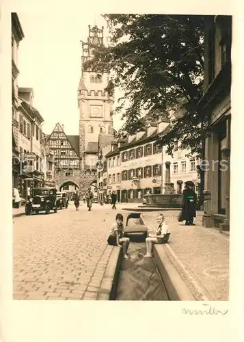 AK / Ansichtskarte Freiburg_Breisgau Brunnen Baechle Fachwerk Stadttor Freiburg Breisgau