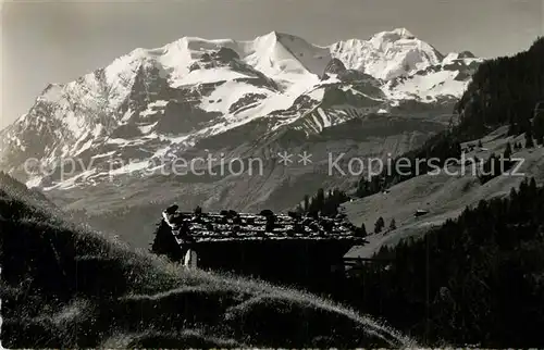 AK / Ansichtskarte Kiental Malerische Huette mit Bluemlisalpgruppe Berner Alpen Kiental