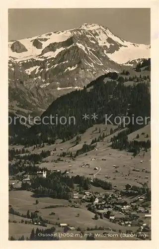 AK / Ansichtskarte Gstaad Panorama Blick zum Wildhorn Berner Alpen Gstaad