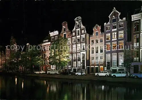 AK / Ansichtskarte Amsterdam_Niederlande Keizersgracht met oude gevels Alte Giebelhaeuser Nachtaufnahme Amsterdam_Niederlande