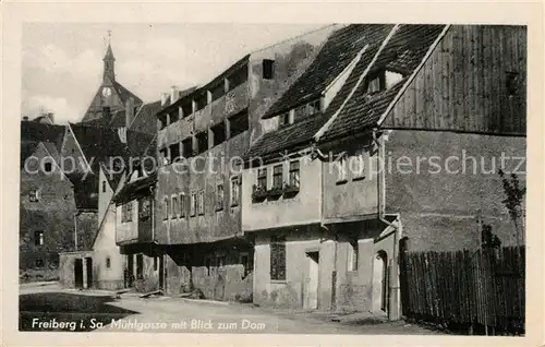 AK / Ansichtskarte Freiberg_Sachsen Muehlgasse mit Blick zum Dom Freiberg Sachsen
