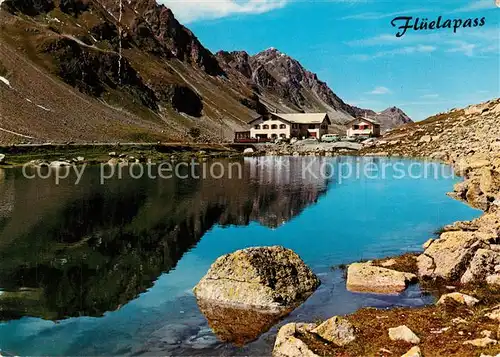 AK / Ansichtskarte Flueelapass Gebirgspass Passhoehe Bergsee Berghotel Flueelapass