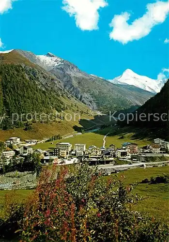 AK / Ansichtskarte Samnaun_Dorf Panorama mit Blick zum Muttler Samnaungruppe Samnaun Dorf