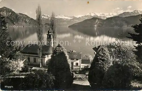 AK / Ansichtskarte Weggis_Vierwaldstaettersee Panorama mit Kirche Weggis_Vierwaldstaettersee