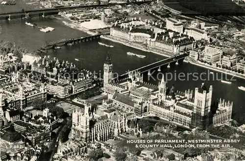 AK / Ansichtskarte London Houses of Parliament Westminster Abbey and County Hall aerial view London