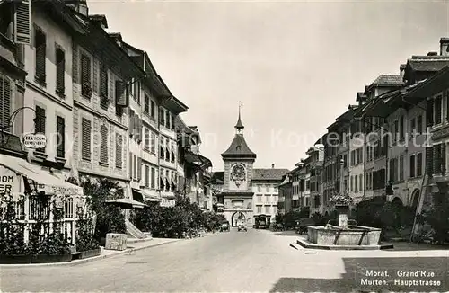 AK / Ansichtskarte Morat_Murten Hauptstrasse mit Brunnen Stadttor Morat Murten
