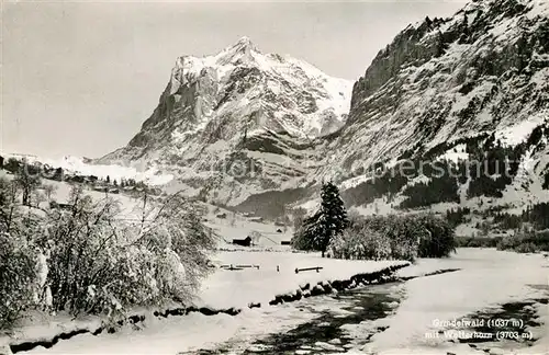 AK / Ansichtskarte Grindelwald Winterpanorama mit Wetterhorn Berner Alpen Grindelwald