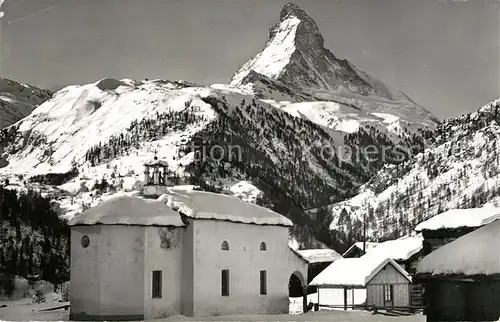 AK / Ansichtskarte Winkelmatten Ortsansicht mit Kapelle Blick zum Matterhorn Walliser Alpen Winkelmatten