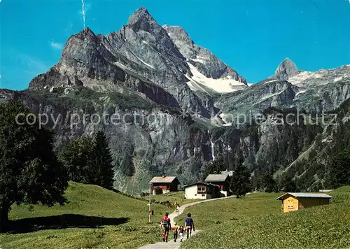 AK / Ansichtskarte Braunwald_GL Wanderweg Blick gegen Ortsstock und Hoher Turm Glarner Alpen Braunwald GL