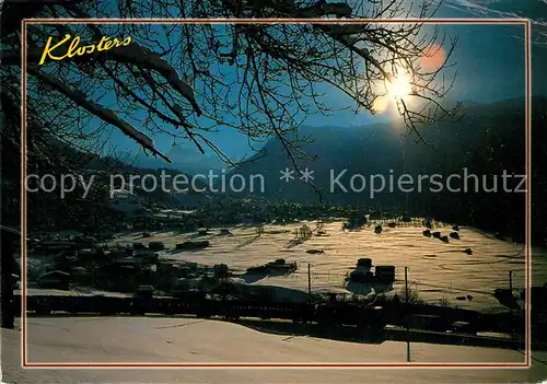 AK / Ansichtskarte Klosters_GR Abendstimmung Wintersportplatz Alpen Klosters_GR