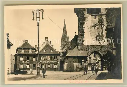 AK / Ansichtskarte Freiburg_Breisgau Schwabentorplatz Gasthof zum Storchen Muensterturm Freiburg Breisgau