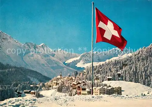 AK / Ansichtskarte Arosa_GR Schweizer Flagge Winterpanorama Alpen Arosa_GR