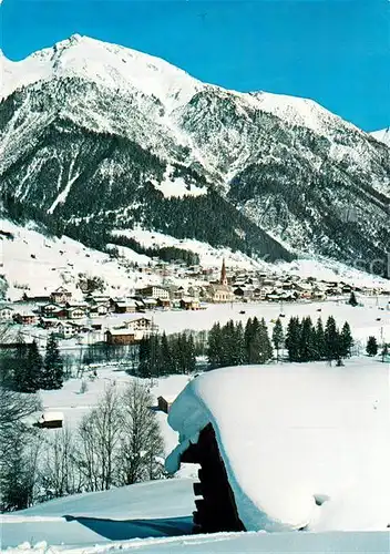 AK / Ansichtskarte Pettneu_Arlberg Gesamtansicht mit Alpenpanorama Winterlandschaft Pettneu Arlberg