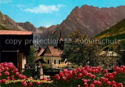 AK / Ansichtskarte Hinterthal Ortsmotiv Bergdorf mit Kirche Blumenhecke Hinterthal