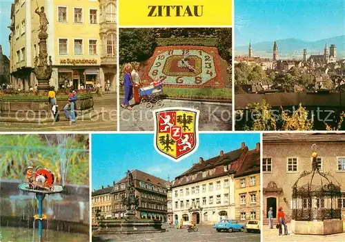 AK / Ansichtskarte Zittau Rolandbrunnen Blumenuhr Teilansicht Schleifermaennchen August Bebel Platz Herkulesbrunnen Gruener Born Stadtmuseum Zittau