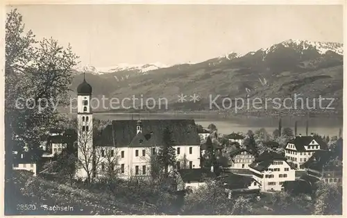 AK / Ansichtskarte Sachseln_OW Ortsansicht mit Kirche Sarnersee Alpenpanorama Sachseln OW