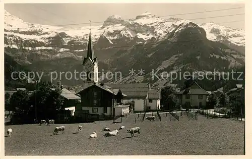 AK / Ansichtskarte Lenk_Simmental Kirche mit Wildstrubel Lenk Simmental