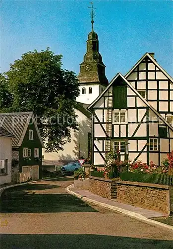AK / Ansichtskarte Nuembrecht Alte Poststrasse Fachwerkhaus Kirche Nuembrecht