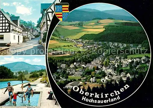 AK / Ansichtskarte Oberkirchen_Sauerland Fachwerkhaeuser Freibad Wassertreten Blick ins Tal Fernsicht Wappen Oberkirchen_Sauerland