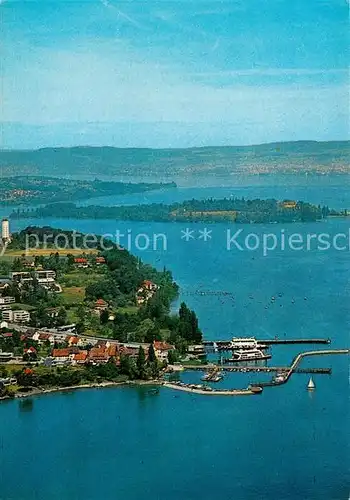 AK / Ansichtskarte Staad_Konstanz Faehrbetrieb im Hintergrund Insel Mainau Fliegeraufnahme Staad_Konstanz