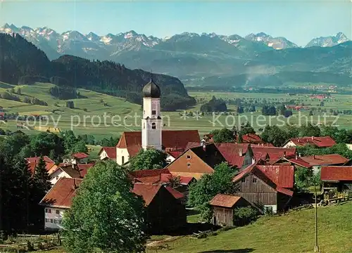 AK / Ansichtskarte Rettenberg_Oberallgaeu Ortsansicht mit Kirche Allgaeuer Alpen Rettenberg Oberallgaeu