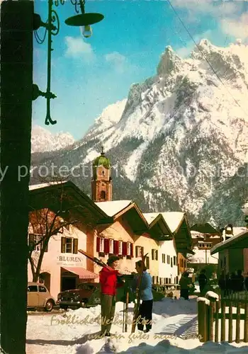 AK / Ansichtskarte Garmisch Partenkirchen Kirchturm Zugspitze Weihnachts und Neujahrsgruesse Garmisch Partenkirchen