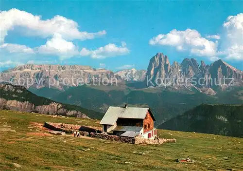 AK / Ansichtskarte Raschoetzhuette mit Langkofel Marmolada und Sellagruppe Raschoetzhuette