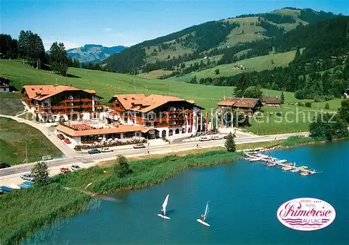 AK / Ansichtskarte Lac_Noir_Schwarzsee_FR Sporthotel Primerose Fliegeraufnahme Lac_Noir_Schwarzsee_FR