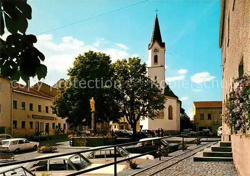 AK / Ansichtskarte Koetzting Dorfbrunnen mit Kirche Koetzting