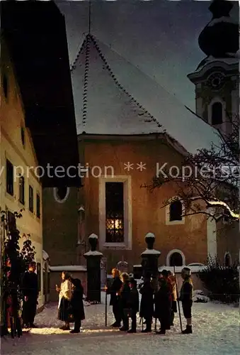 AK / Ansichtskarte Arnsdorf_Lamprechtshausen Schulhaus zu Arnsdorf am Abend Geburtsstaette des Liedes Stille Nacht 
