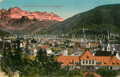 AK / Ansichtskarte Gries_Quirein_Bozen Stadtpanorama mit Kirche Blick zum Rosengarten Dolomiten Gries_Quirein_Bozen