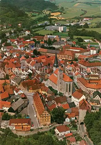 AK / Ansichtskarte Muennerstadt Fliegeraufnahme mit Stadtpfarrkirche St Maria Magdalena Muennerstadt