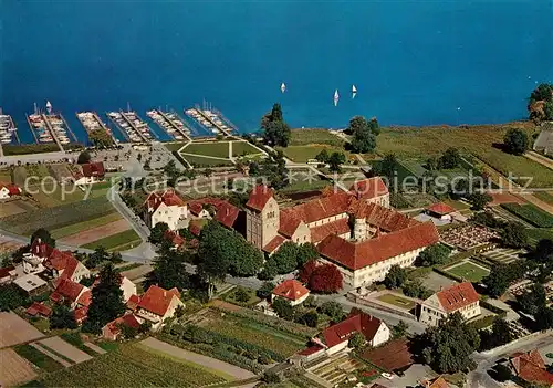 AK / Ansichtskarte Mittelzell Marienmuenster ehemalige Benediktinerabtei Hafen Fliegeraufnahme Mittelzell