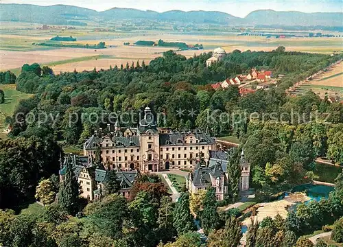 AK / Ansichtskarte Bueckeburg Schloss Bueckeburg mit Mausoleum und Wesergebirge Fliegeraufnahme Bueckeburg