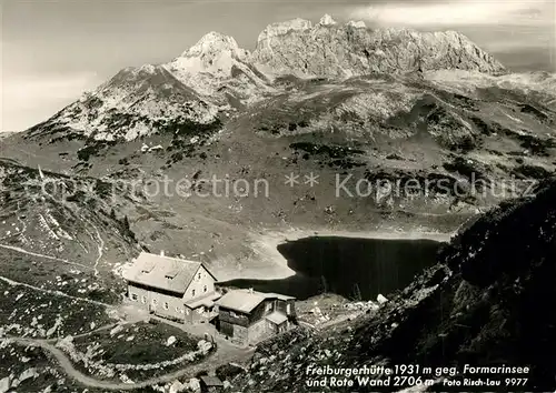 AK / Ansichtskarte Freiburgerhuette mit Formarinsee und Rote Wand Freiburgerhuette