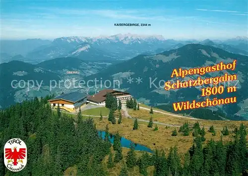 AK / Ansichtskarte Thierbach_Wildschoenau Berggasthof Schatzbergalm Alpenpanorama Kaisergebirge Fliegeraufnahme Thierbach Wildschoenau