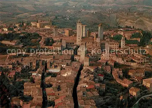 AK / Ansichtskarte Gimignano Fliegeraufnahme Gimignano