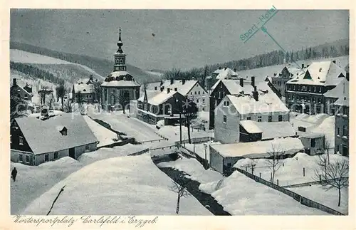 AK / Ansichtskarte Carlsfeld_Erzgebirge Kirche Winteraufnahme Carlsfeld Erzgebirge