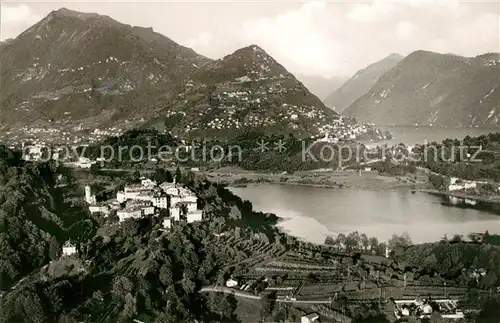 AK / Ansichtskarte Muzzano Nello sfondo Monte Bre e Lugano veduta aerea Muzzano