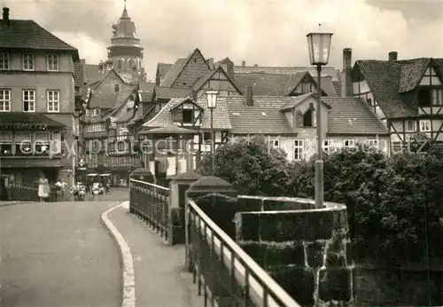 AK / Ansichtskarte Hann._Muenden Blick ueber die Weserbruecke auf St Blasienkirche Hann. Muenden