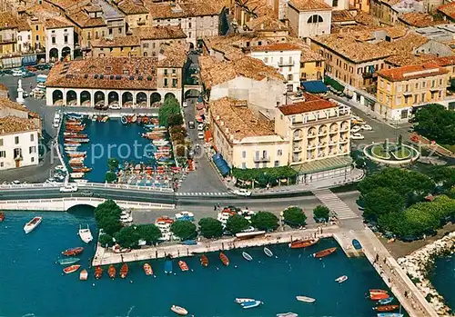 AK / Ansichtskarte Desenzano_Lago_di_Garda Fliegeraufnahme Hafenpartie Desenzano_Lago_di_Garda