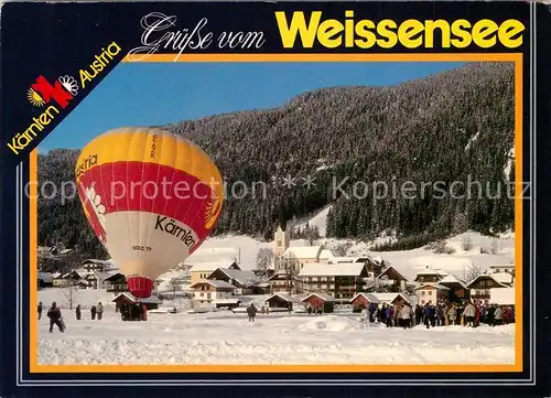 AK / Ansichtskarte Weissensee_Kaernten Winterpanorama mit Heissluftballon Weissensee Kaernten