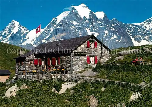 AK / Ansichtskarte Rotstockhuette Berghuette mit Moench und Jungfrau Berner Alpen Rotstockhuette