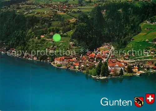 AK / Ansichtskarte Gunten_Thunersee Fliegeraufnahme Gunten Thunersee