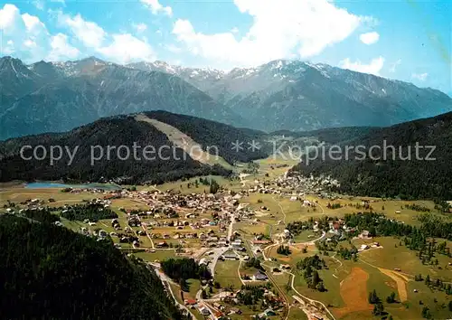 AK / Ansichtskarte Seefeld_Tirol gegen Gschwandkopf Mieminger Kette Fliegeraufnahme Seefeld Tirol