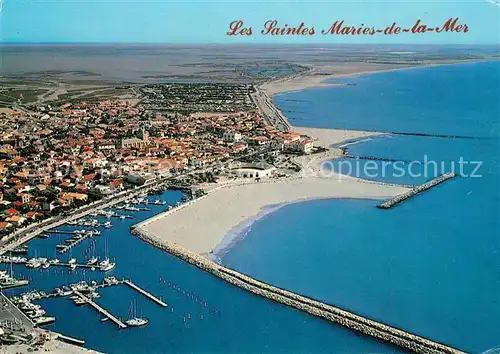 AK / Ansichtskarte Les_Saintes Maries de la Mer Vue aerienne le Port et le village Les