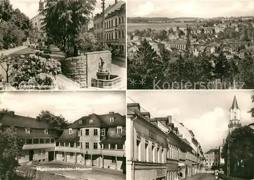 AK / Ansichtskarte Markneukirchen Zschucke Brunnen Musikinstrumente Museum Thaelmann Platz Markneukirchen