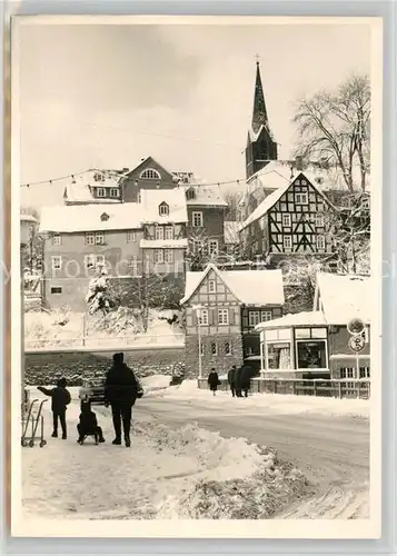 AK / Ansichtskarte Bad_Berleburg Ortsmotiv mit Kirche im Winter Bad_Berleburg