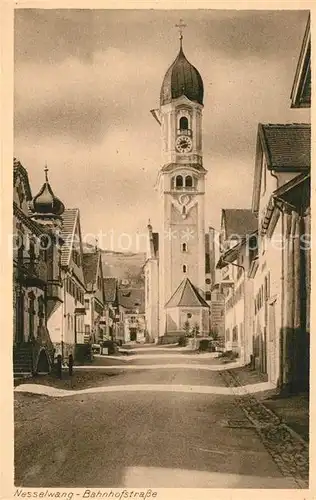 AK / Ansichtskarte Nesselwang Bahnhofstrasse Kirche Nesselwang